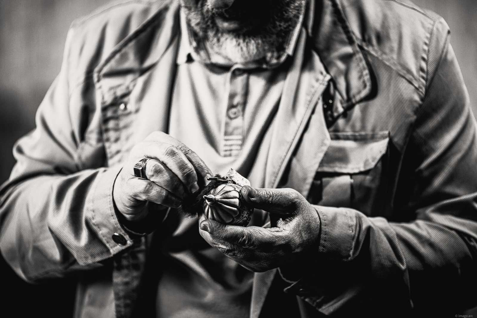 Close-up of an artisan's weathered hands at work, Istanbul, Turkey